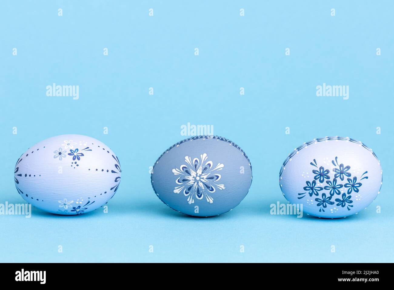 Easter eggs on blue background Stock Photo