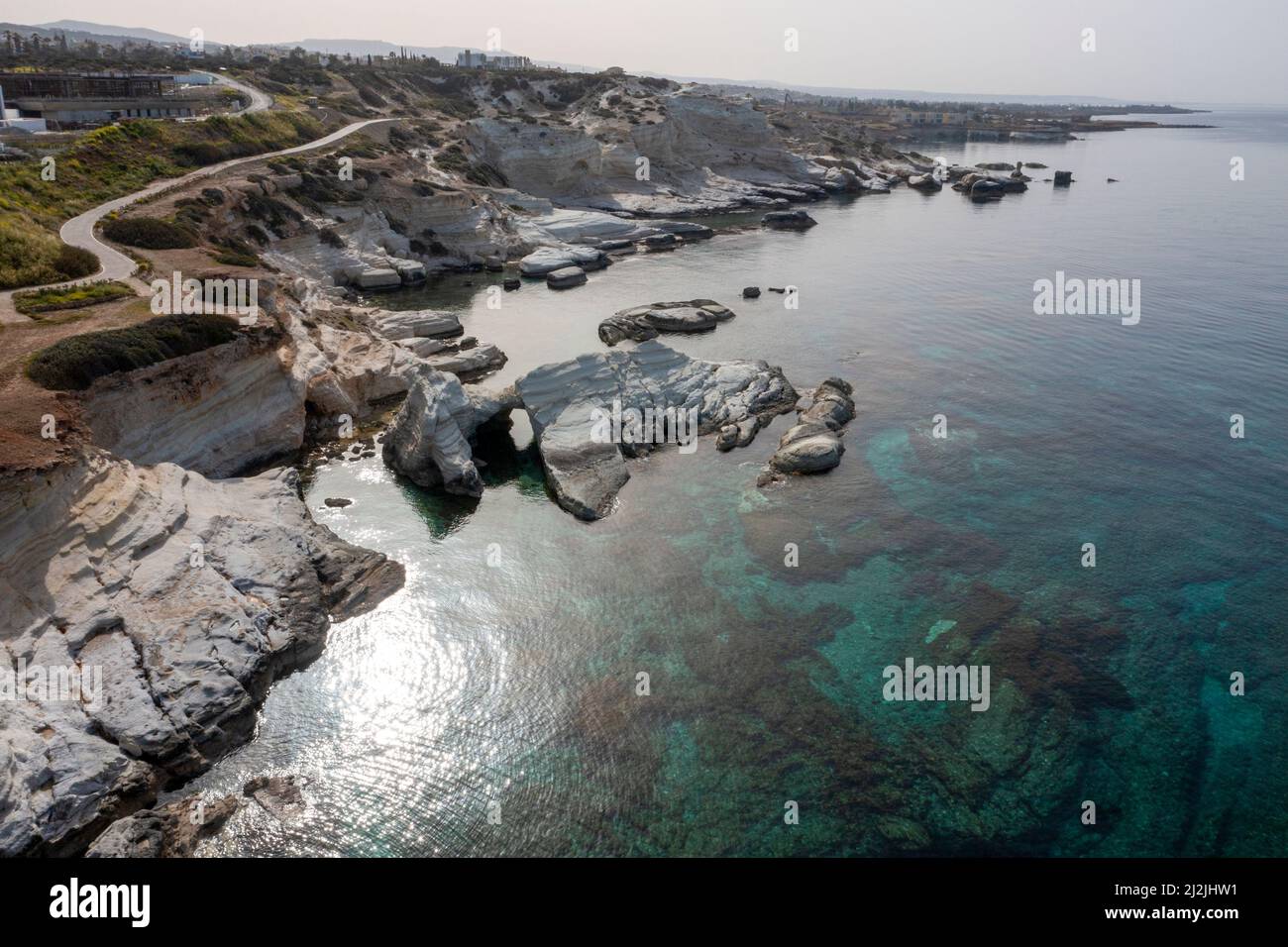 Aerial view of limestone rock formations on the coastline at Sea Caves, Peyia, Paphos, Cyprus. Stock Photo