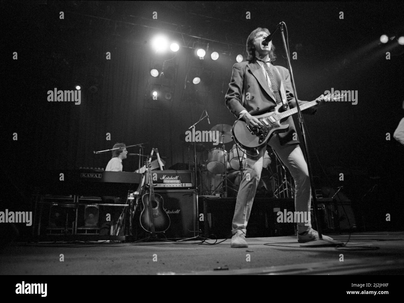 English musician Ray Davies performing with The Kinks at the Lyceum