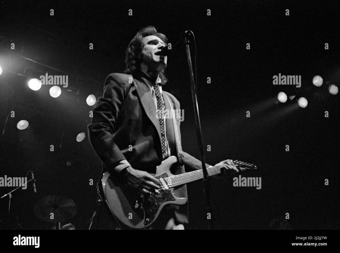 English musician Ray Davies performing with The Kinks at the Lyceum