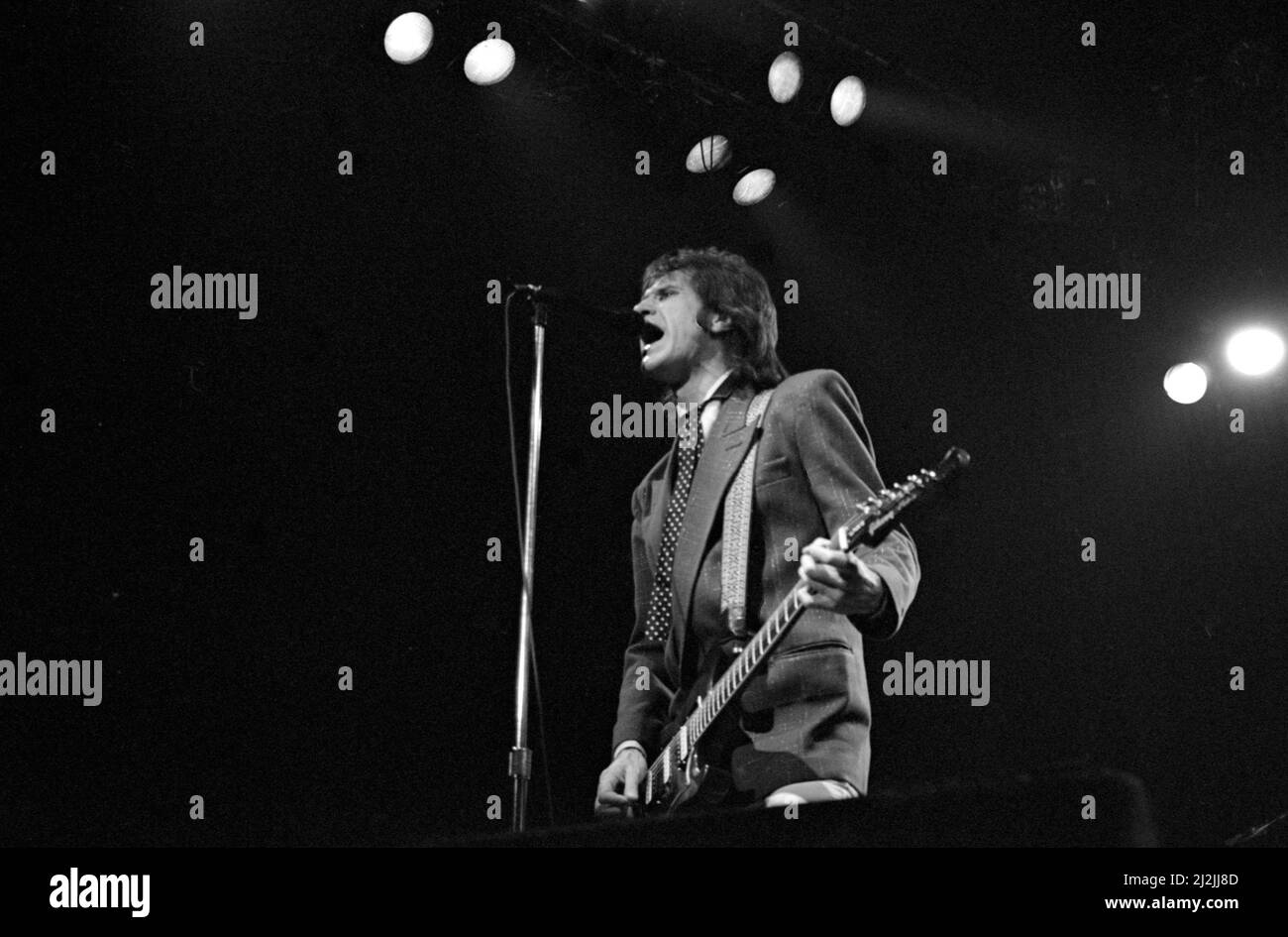 English musician Ray Davies performing with The Kinks at the Lyceum