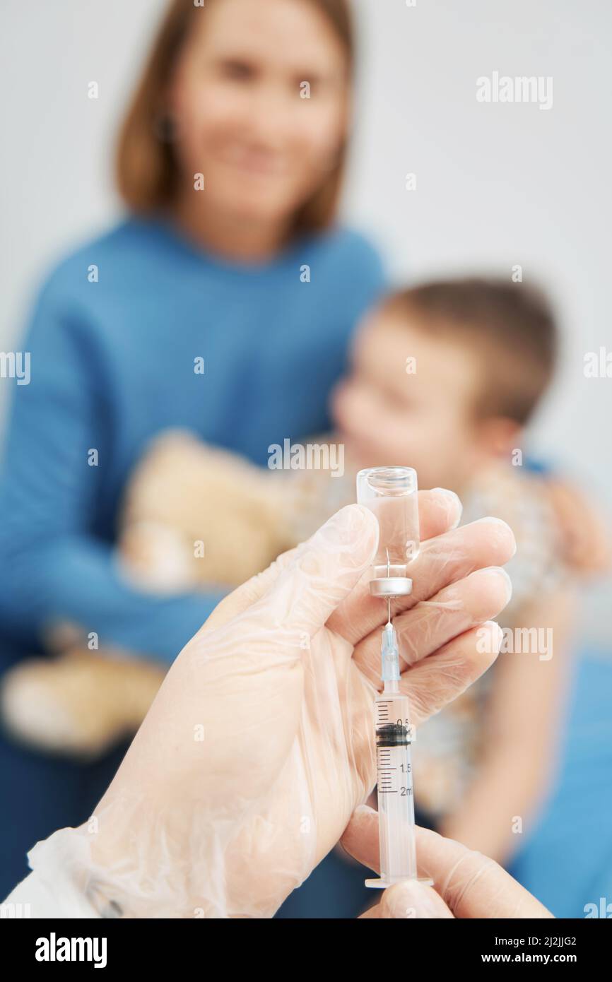 Doctor hands filling syringe with medication in clinic Stock Photo Alamy