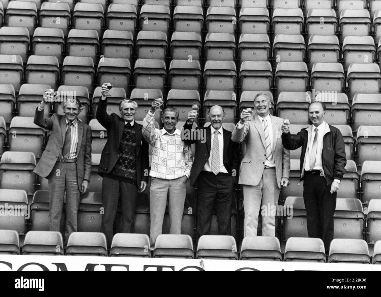Raising their glasses are former Gateshead stars (left to right) Jacke Callender, Tommy Callender, Johnny Ingham, Ken Smith, Bob Gray and Johnny Campbell. 19th August 1988. Stock Photo