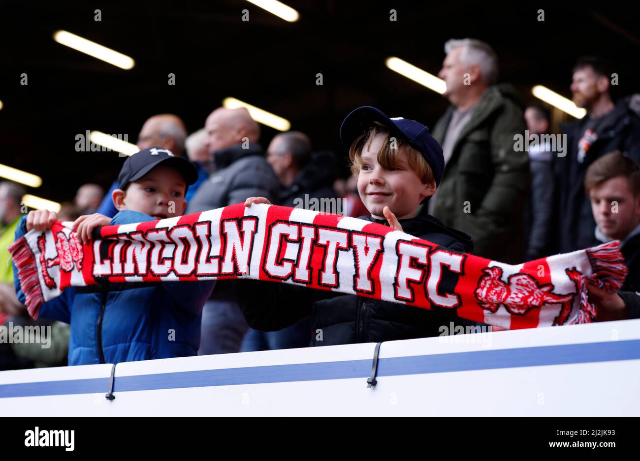 Young Lincoln City fans watch the game from the stands during the Sky Bet League One match at The Valley, London. Picture date: Saturday April 2, 2022. Stock Photo