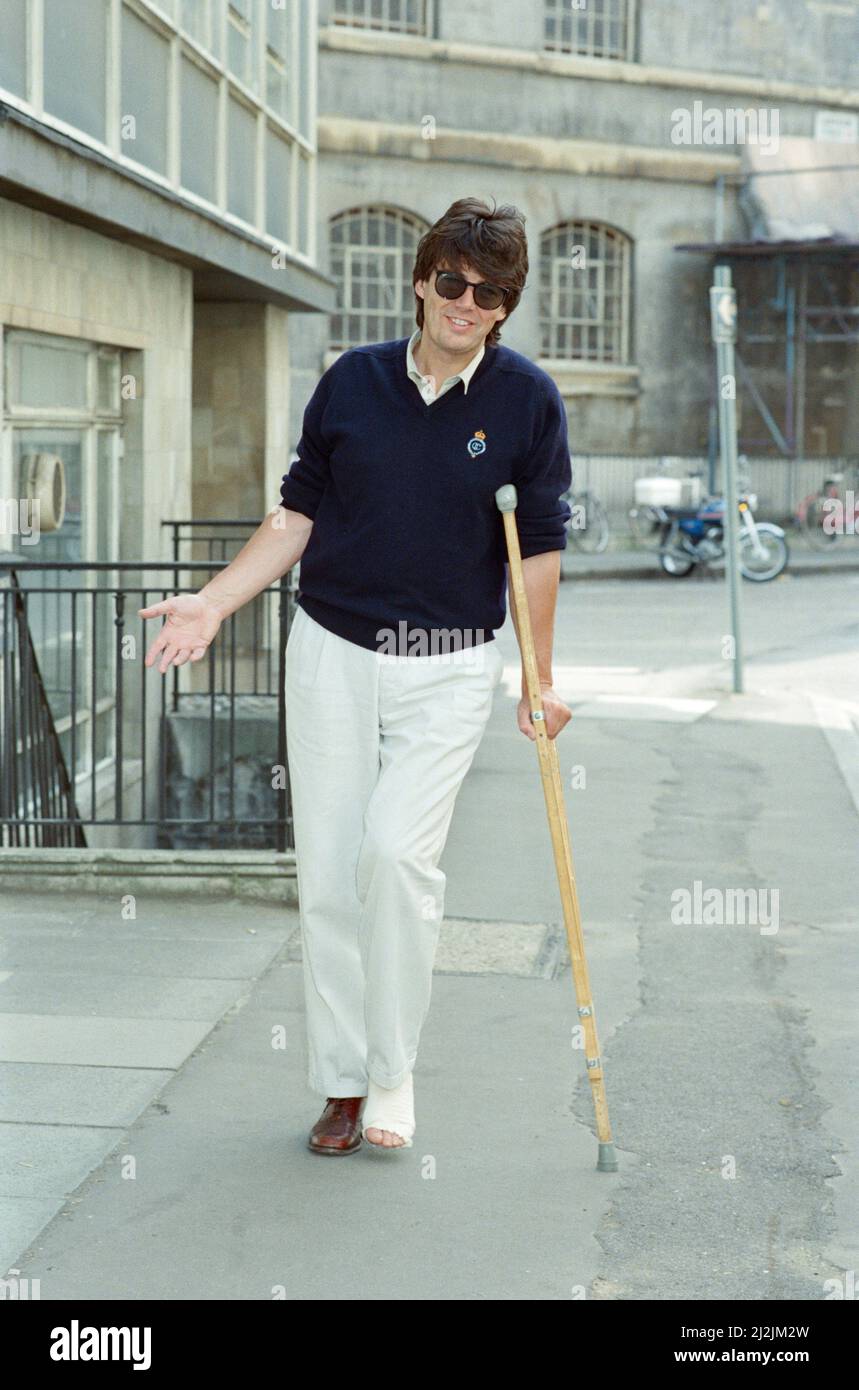 Mike Read, BBC Radio Disc Jockey, seen here on crutches. Picture taken 25th June 1988 Stock Photo
