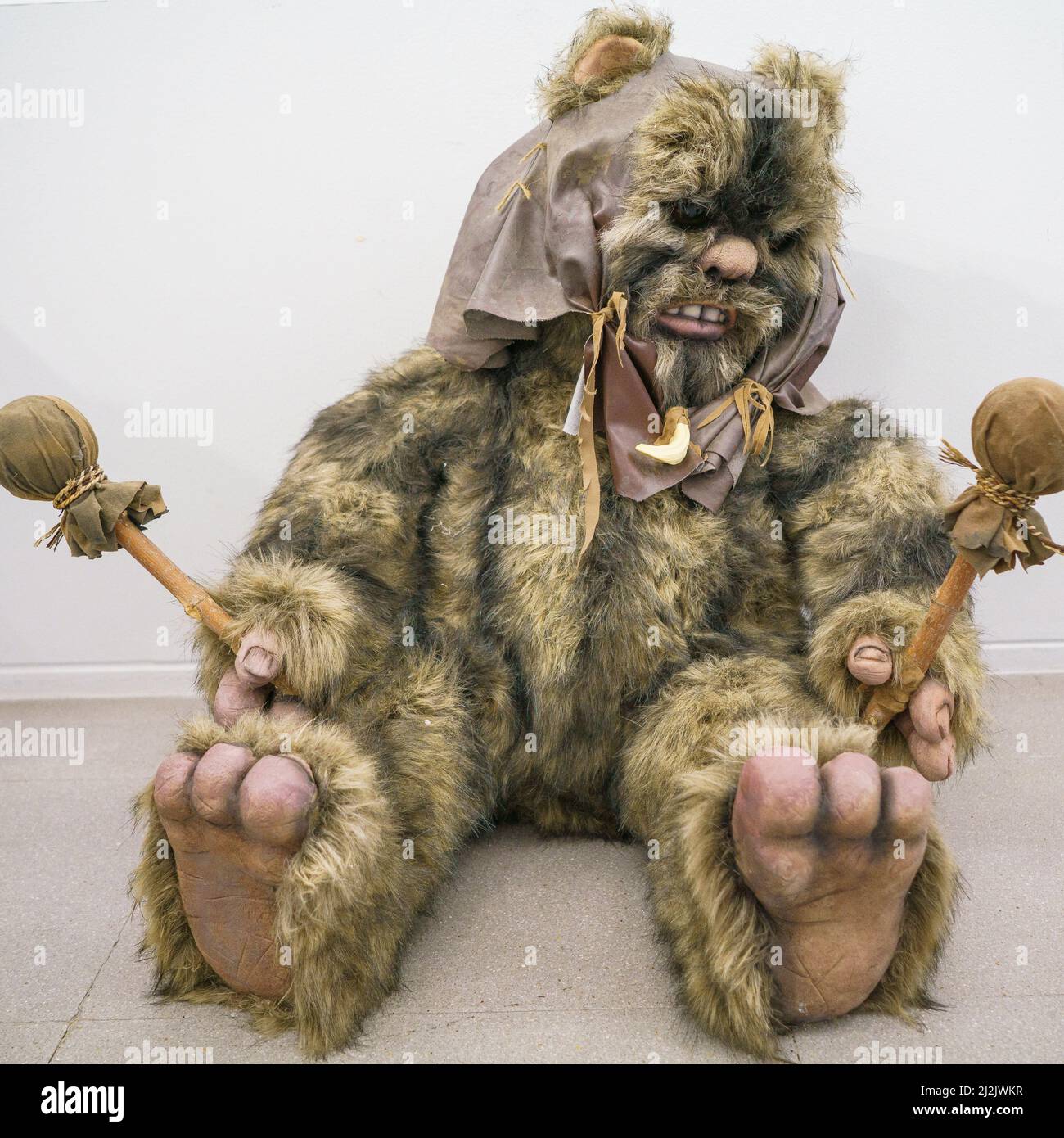 A figure of the character Ewok is exhibited during the exhibition of 'the Star Wars universe' by the sculptor Juan Villa at the Paco de Lucía exhibition hall in Madrid. The Star Wars universe can be visited for free until April 28 at the Paco de Lucía exhibition hall. The exhibited pieces are part of the work that this master craftsman is developing with his team for the future permanent exhibition Puerto Espacio, a science fiction project of his own. Stock Photo
