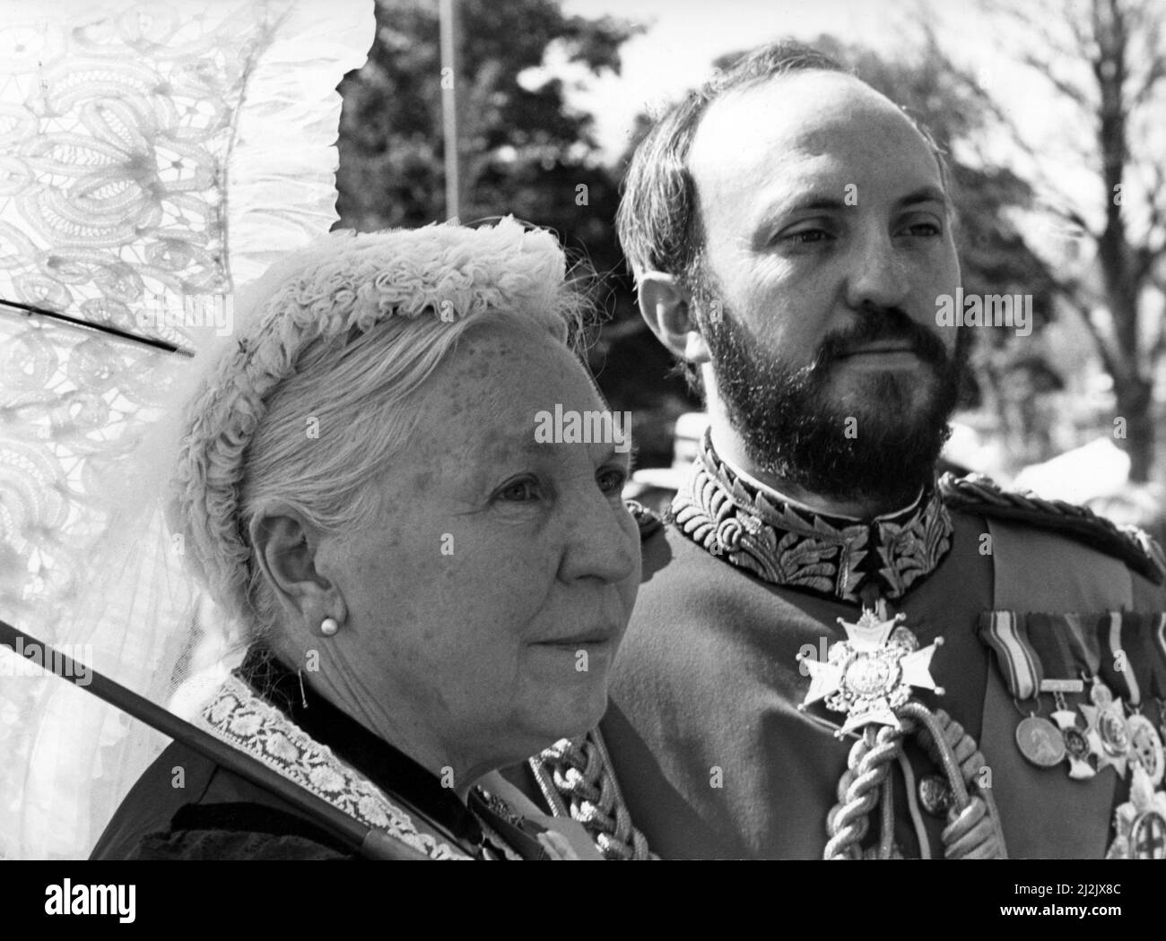 Looking for all the world like the real Queen Victoria and her consort are Alice and George De Mellet De Bonas who did a grand tour of both the Marine Parade at Saltburn Kirkleatham fair. 7th August 1988. Stock Photo
