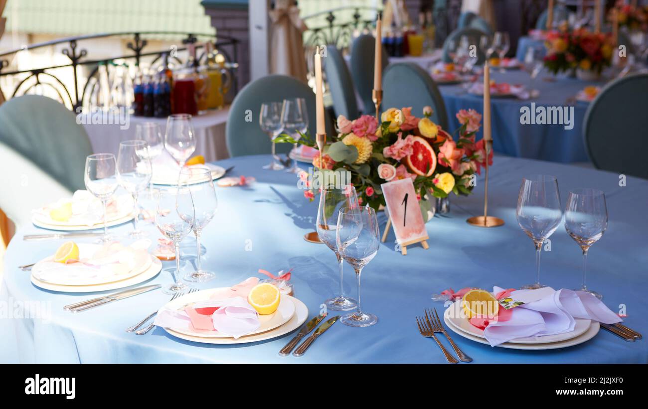 Wedding day event organization table setting decor Stock Photo - Alamy