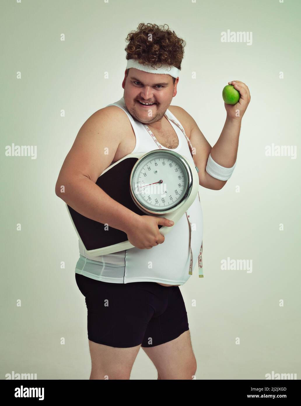 Overweight man scale hi-res stock photography and images - Alamy