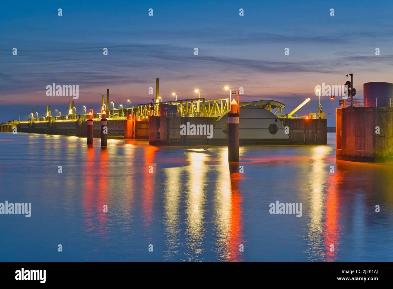 Blue hour at the Ems barrier, East Frisia, Lower Saxony, Germany Stock Photo