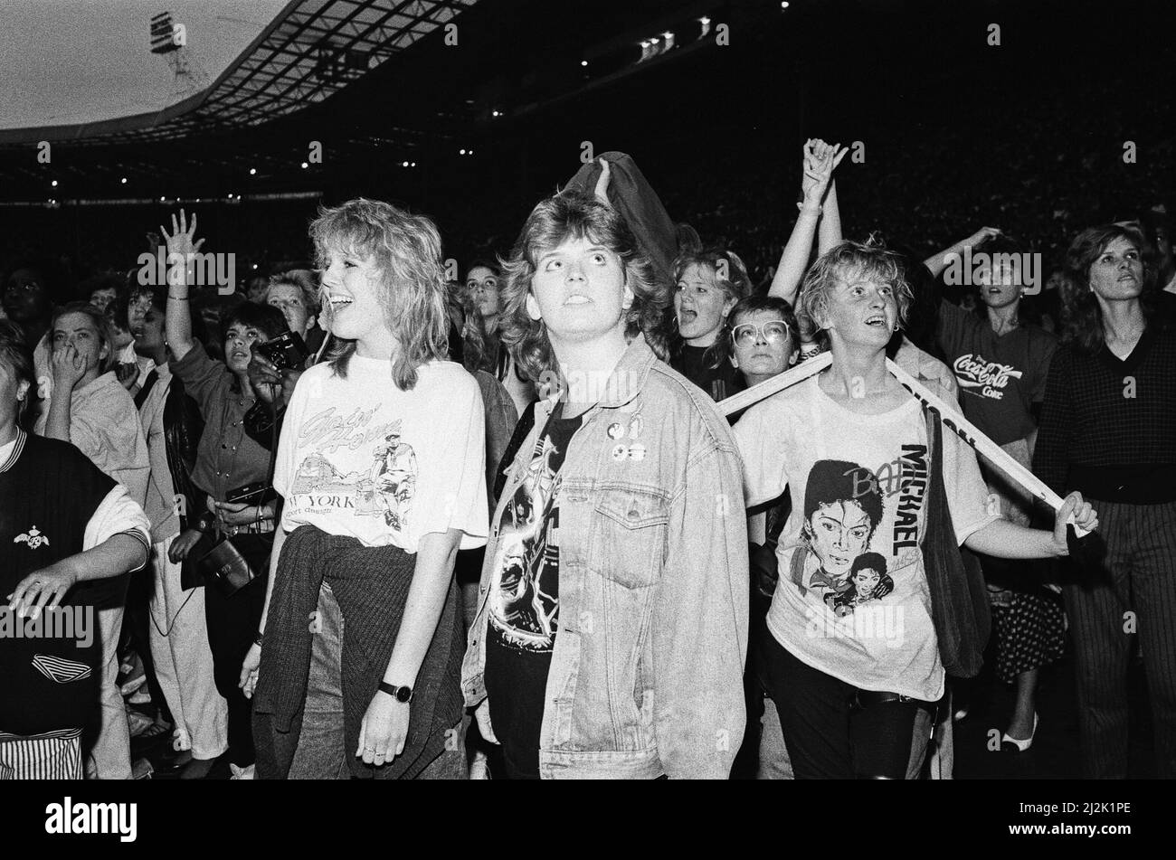 Michael Jackson fans in the audience at Wembley Stadium during his "Bad