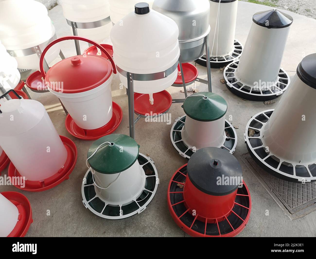 The assortment of chicken feeders for sale Stock Photo Alamy