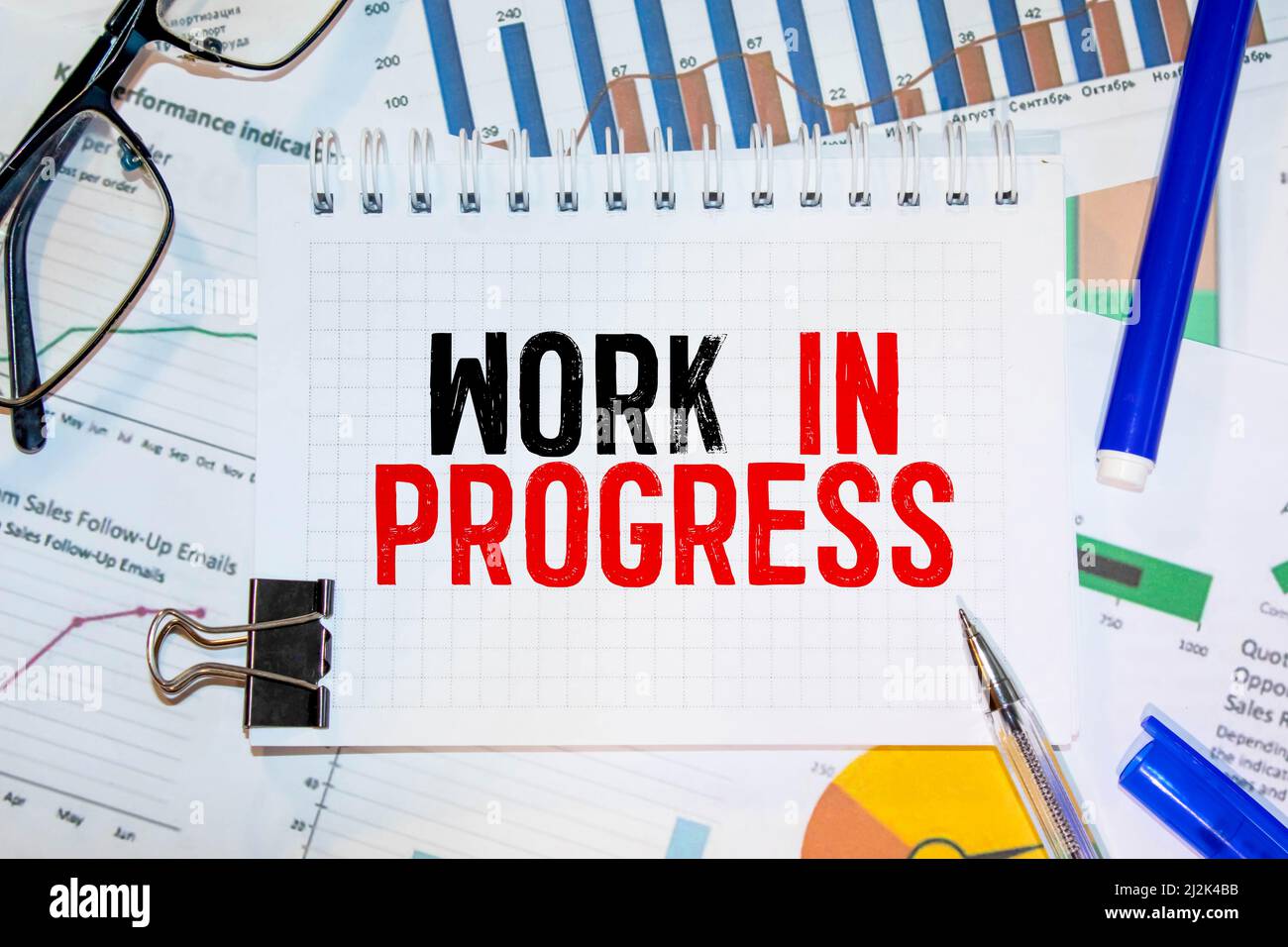 Work in Progress text written on a notebook with pencils Stock Photo ...