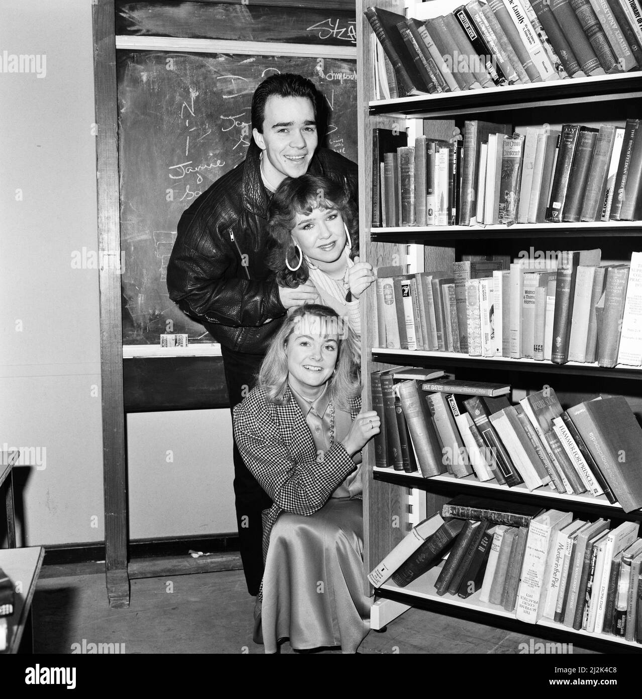 Past and present members of the cast of the BBC children's television series Grange Hill celebrate the programme's 10th anniversary at the BBC in Borehamwood, Hertfordshire. Top to bottom: Todd Carty, Susan Tully and Alison Bettles. 3rd February 1987. Stock Photo