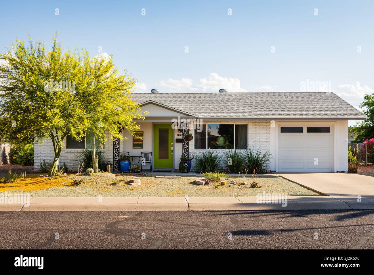 White house with green mid-century modern door in Sun City, Arizona, United States. Stock Photo