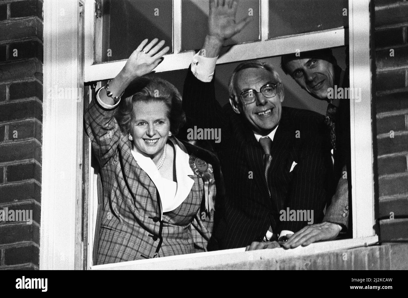 Prime Minister Margaret Thatcher, her husband, Denis Thatcher and Conservative Party chairman, Norman Tebbit, celebrate winning a third term in government for the Conservative Party, from a window at Conservative Central Office in Smith Square, Westminster. 12 June 1987. Stock Photo