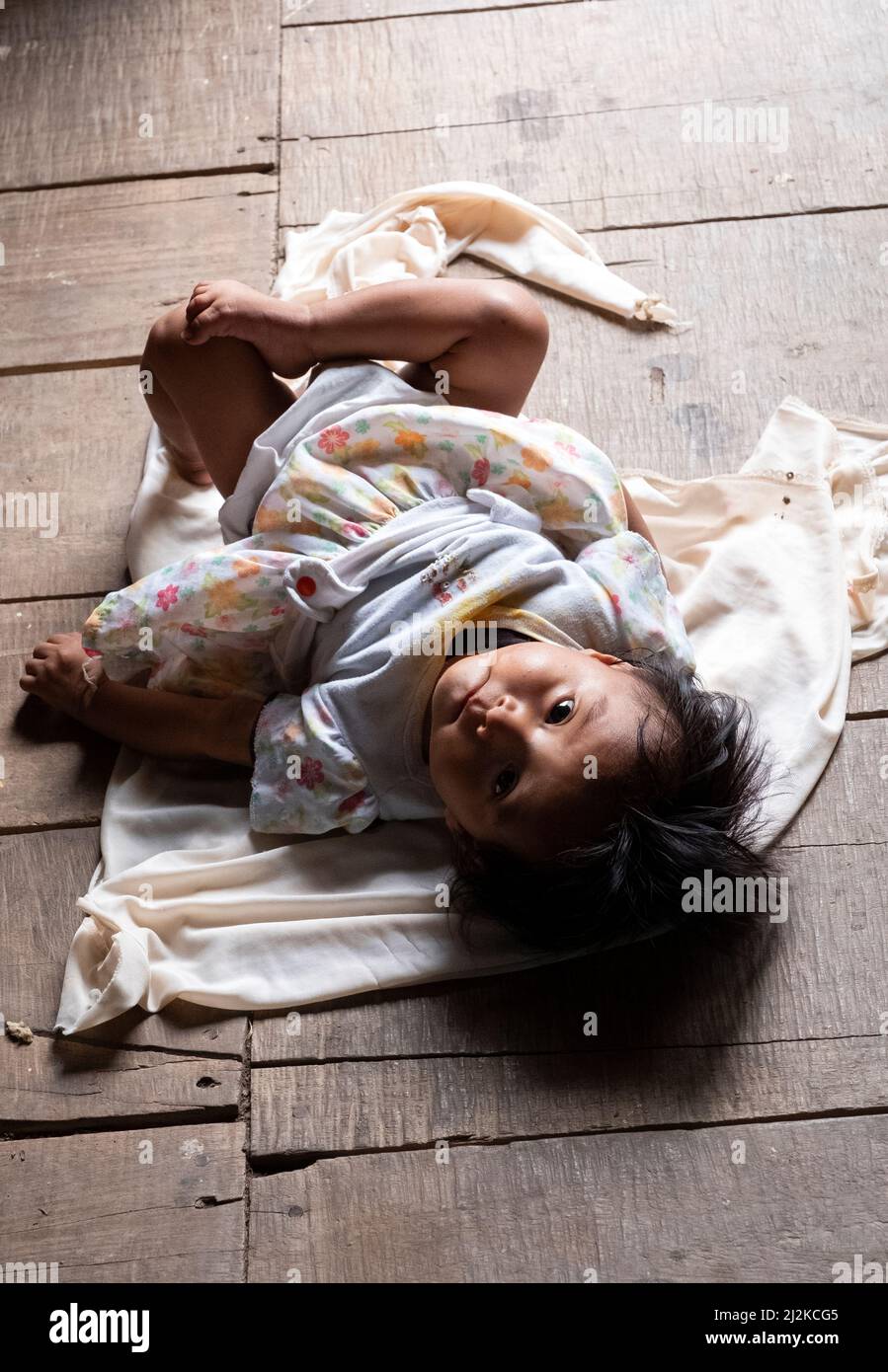 Mother Teresa sister listening to the prayers of a Nicaraguan immigrant