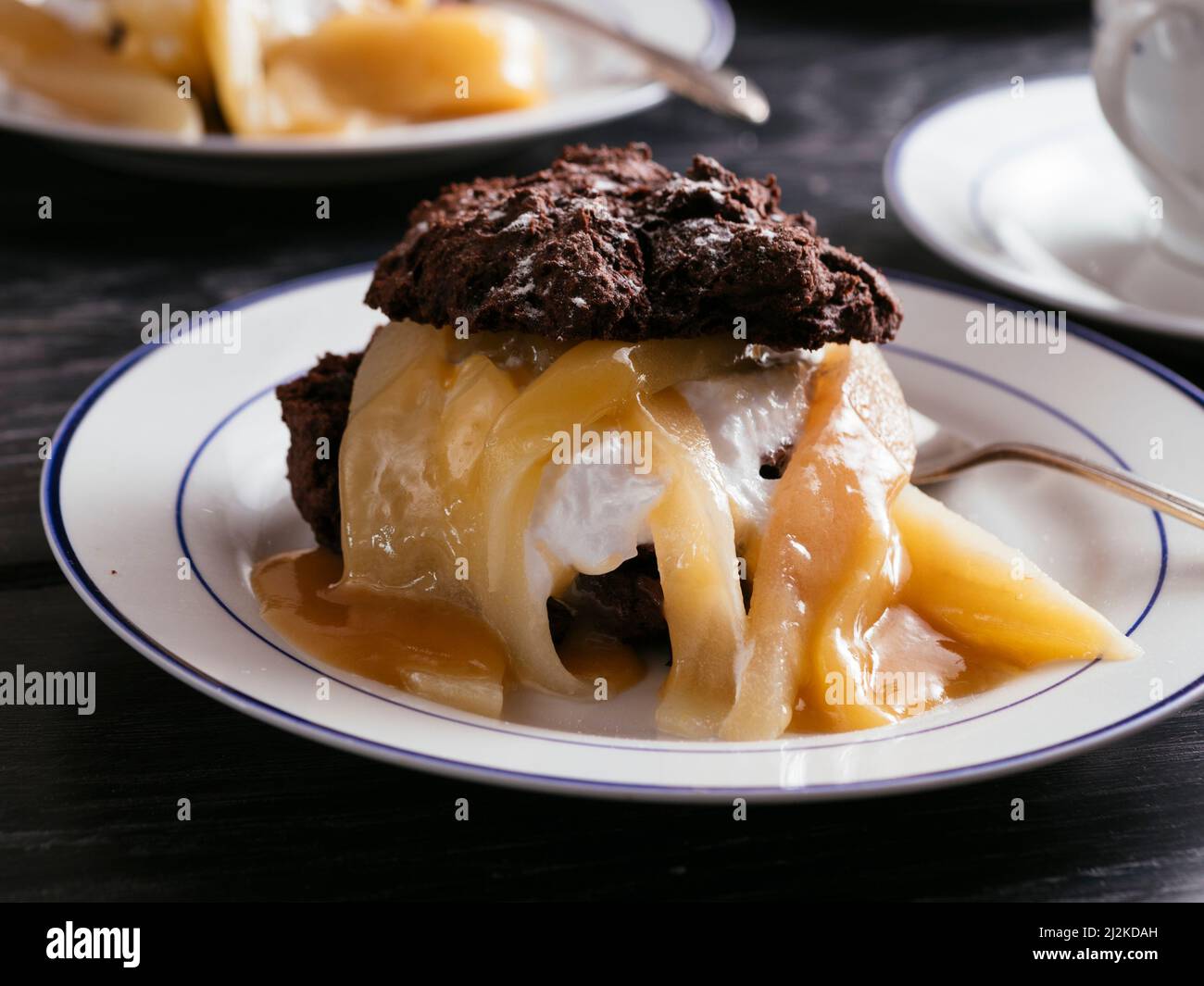 Vegan Chocolate Shortcakes with Pears and Caramel Sauce Stock Photo