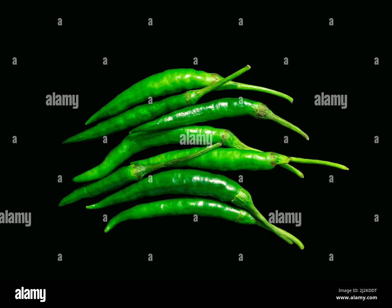 Top view of green chilies Stock Photo - Alamy
