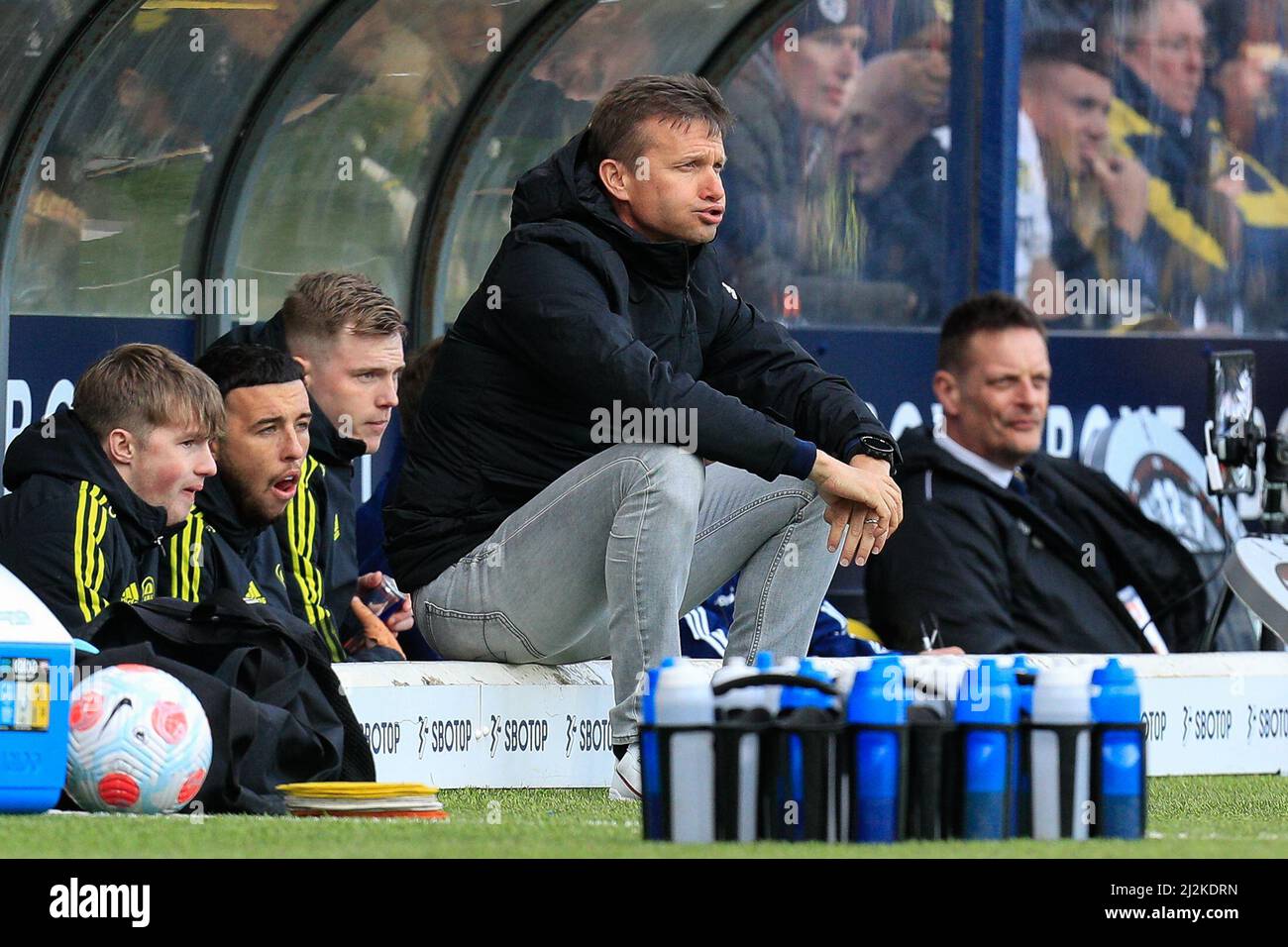 Jesse Marsch manager of Leeds United sits down in his technical area during the game Stock Photo