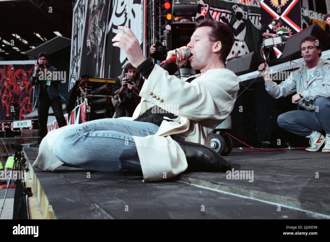 Jim Kerr, singer with the group Simple Minds, performing at the Nelson