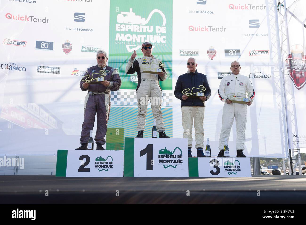 2nd April 2022 ; Circuit de Barcelona-Catalunya, Spain; Espiritu de Montjuic: podium ceremony (L-R) 2nd place Lotus Seven driven by Florent Cazalot, 1st place Ford GT 40 driven by Jordi Puig and Alberto Pecanins, 3rd place Lotus Seven driven by Joao Mira Gomes and Nuno Afoito celebrate after the race Stock Photo