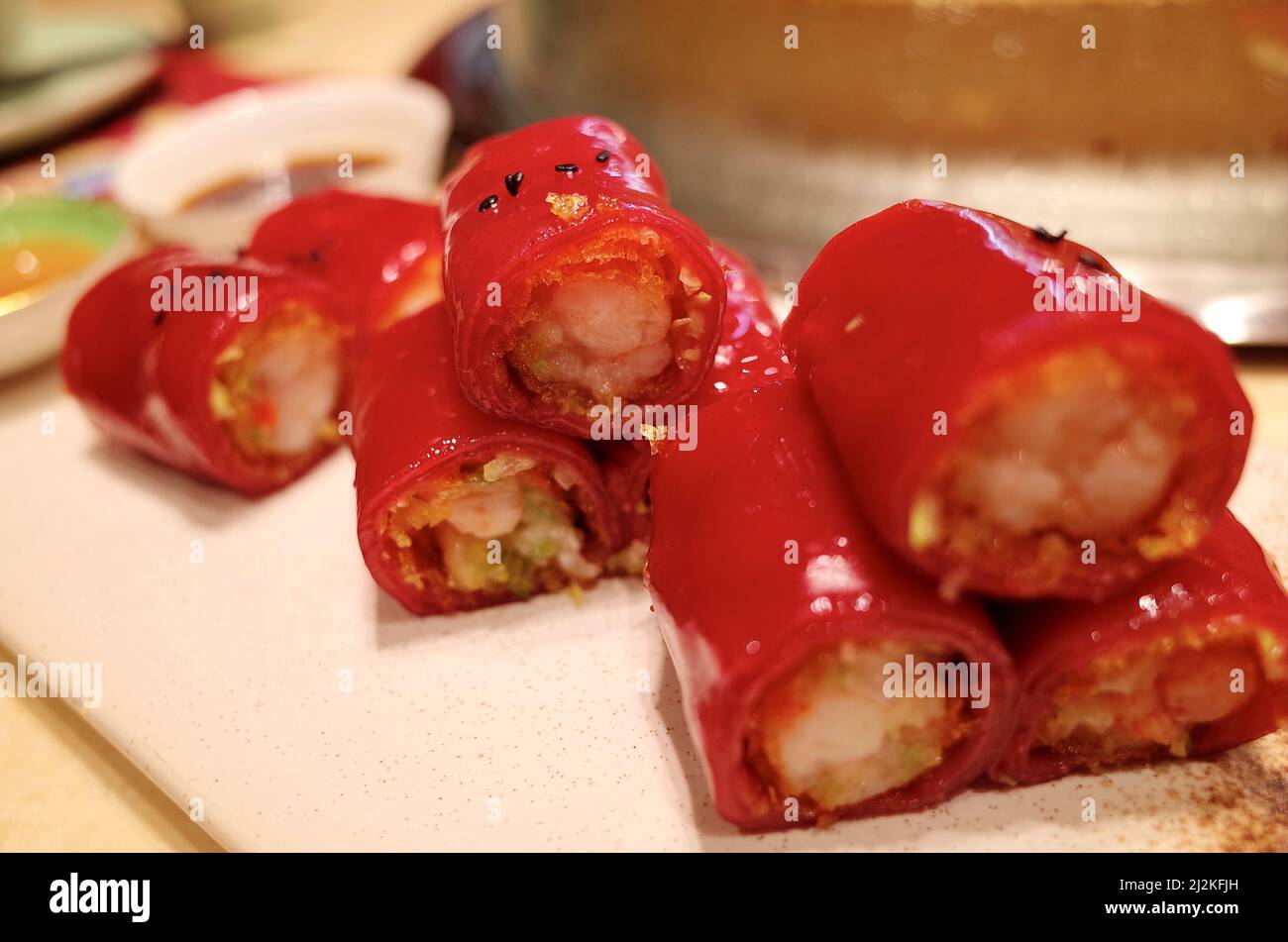 The Cantonese Dim Sum - rice noodle roll made with red rice and shrimp