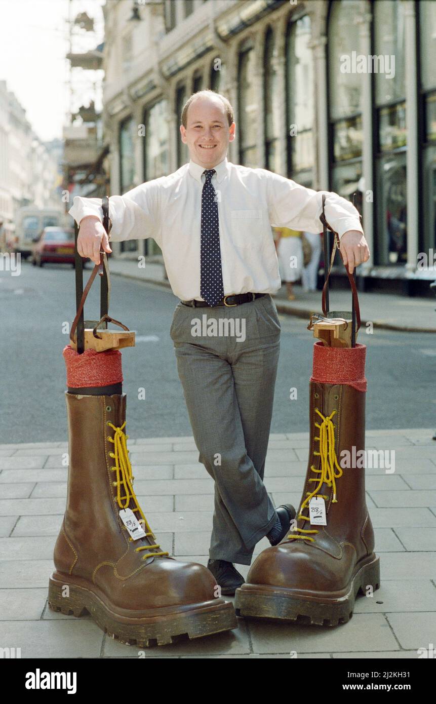 Sotheby's auction of Elton John items. Elton's famous Doc Martin boots were  marched out of an auction for a record £11,000 - in he hands of their  maker. The 4ft 61/2 inch