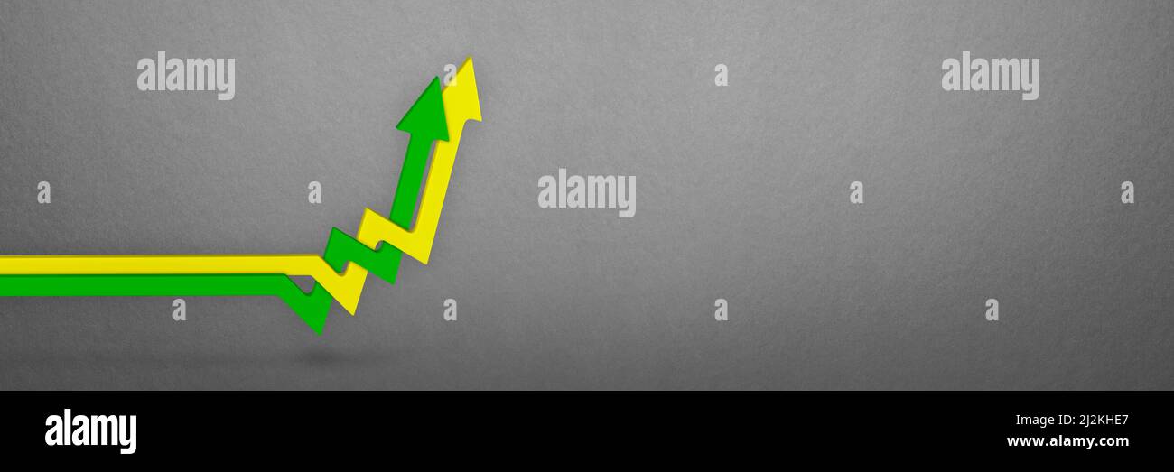 Inflation, rising inflation. Rising prices. Yellow and green arrows intertwined on the chart pointing up, gray background. Growth concept Stock Photo