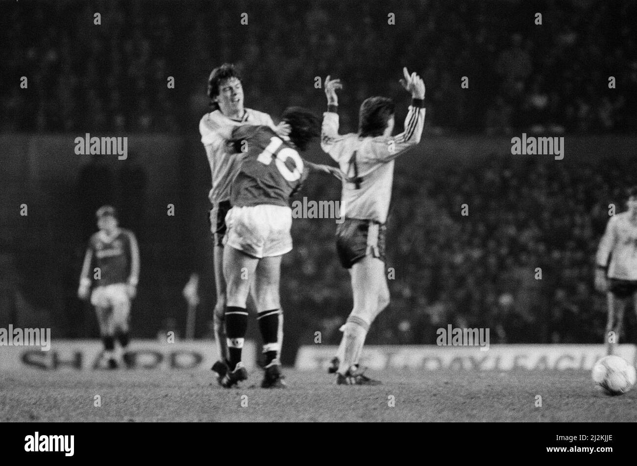 Manchester United 2-0 Arsenal, Old Division One, Old Trafford, January 24th 1987.(Picture) David O'Leary and Terry Gibson (no.10) clash off the ball. Stock Photo
