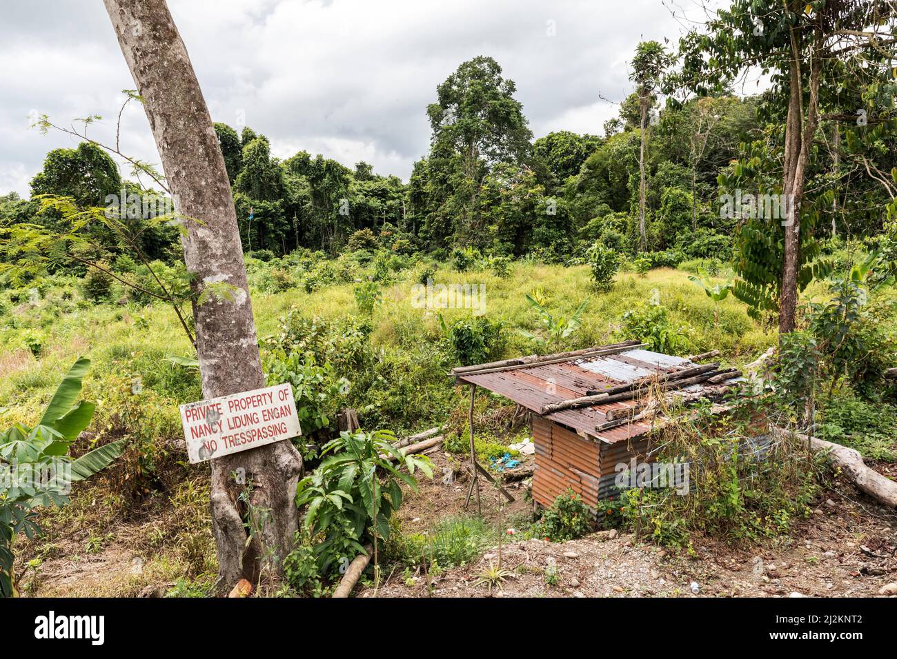 Private property, no trespassing sign on edge of Gunung Mulu national park, Malaysia Stock Photo