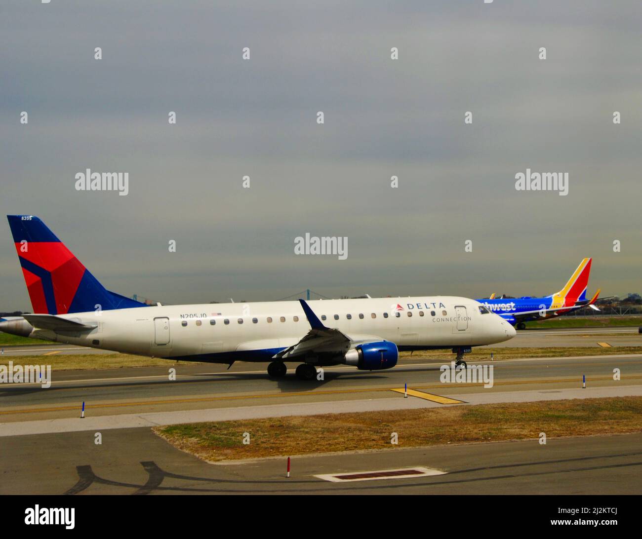 Delta airlines jet ready for takeoff at La Guardia airport with a