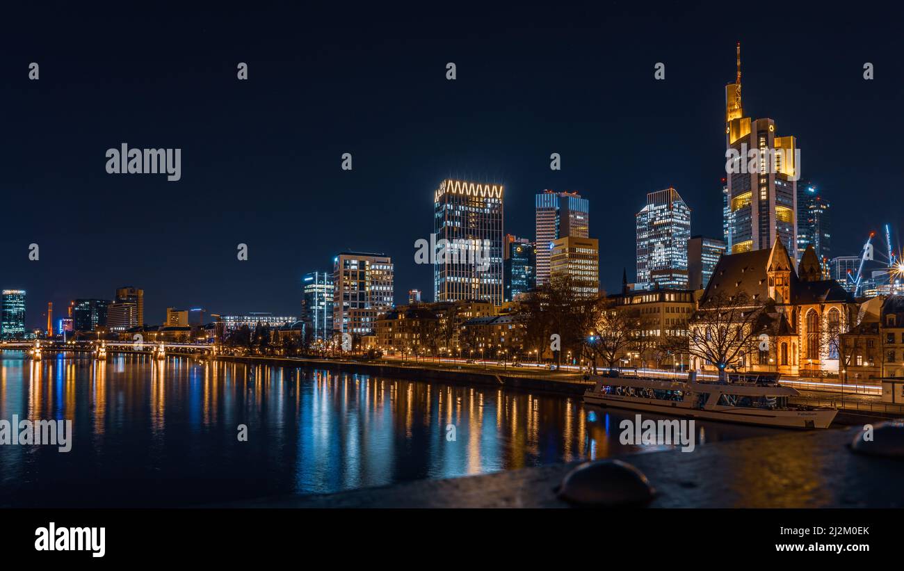 The illuminated buildings with the reflection on water at night Stock ...