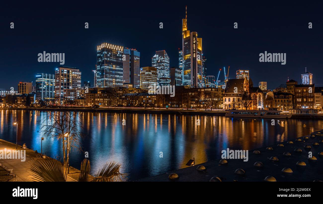 The illuminated buildings with the reflection on water at night Stock ...