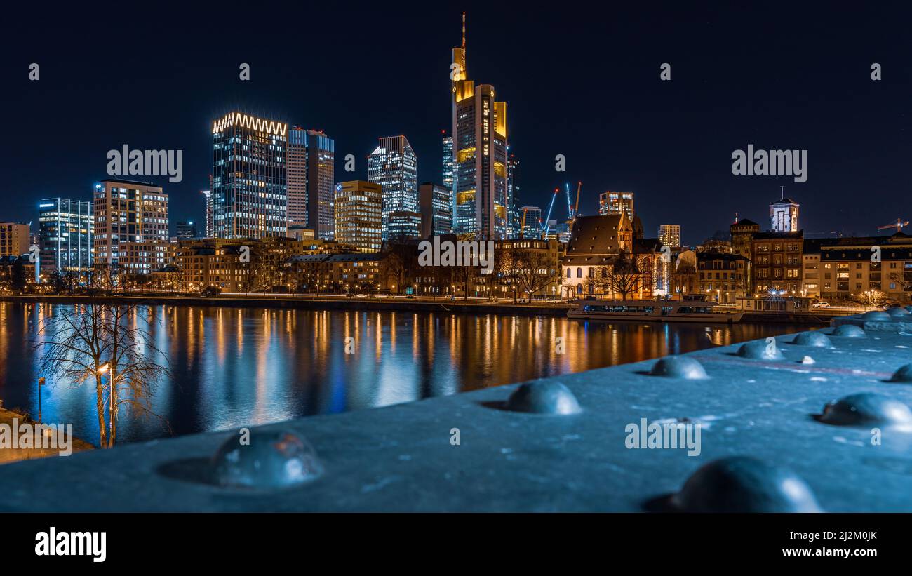The illuminated buildings with the reflection on water at night Stock ...