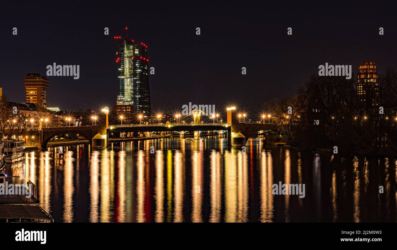 The illuminated buildings with the reflection on water at night Stock ...