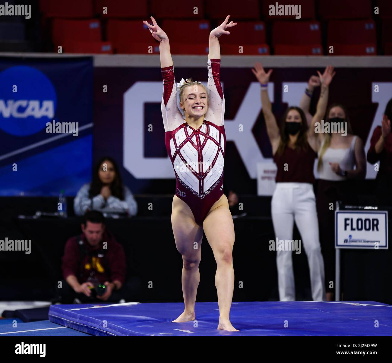 Minnesota's Gianna Gerdes completes a tumbling pass during Session 2 of the NCAA Women's