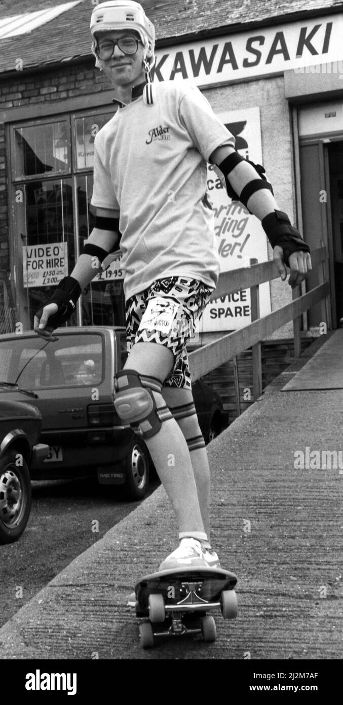 Skateboarding helmet teenager Black and White Stock Photos & Images - Alamy