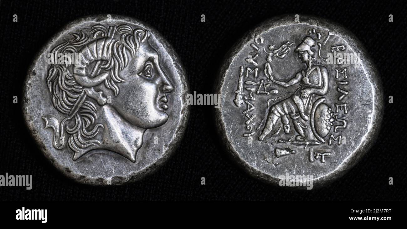 Ancient coin with Alexander the Great portrait and Athena, inscription King Lysimachus on Greek. Silver tetradrachm coin, old rare money, 290 BC. Conc Stock Photo