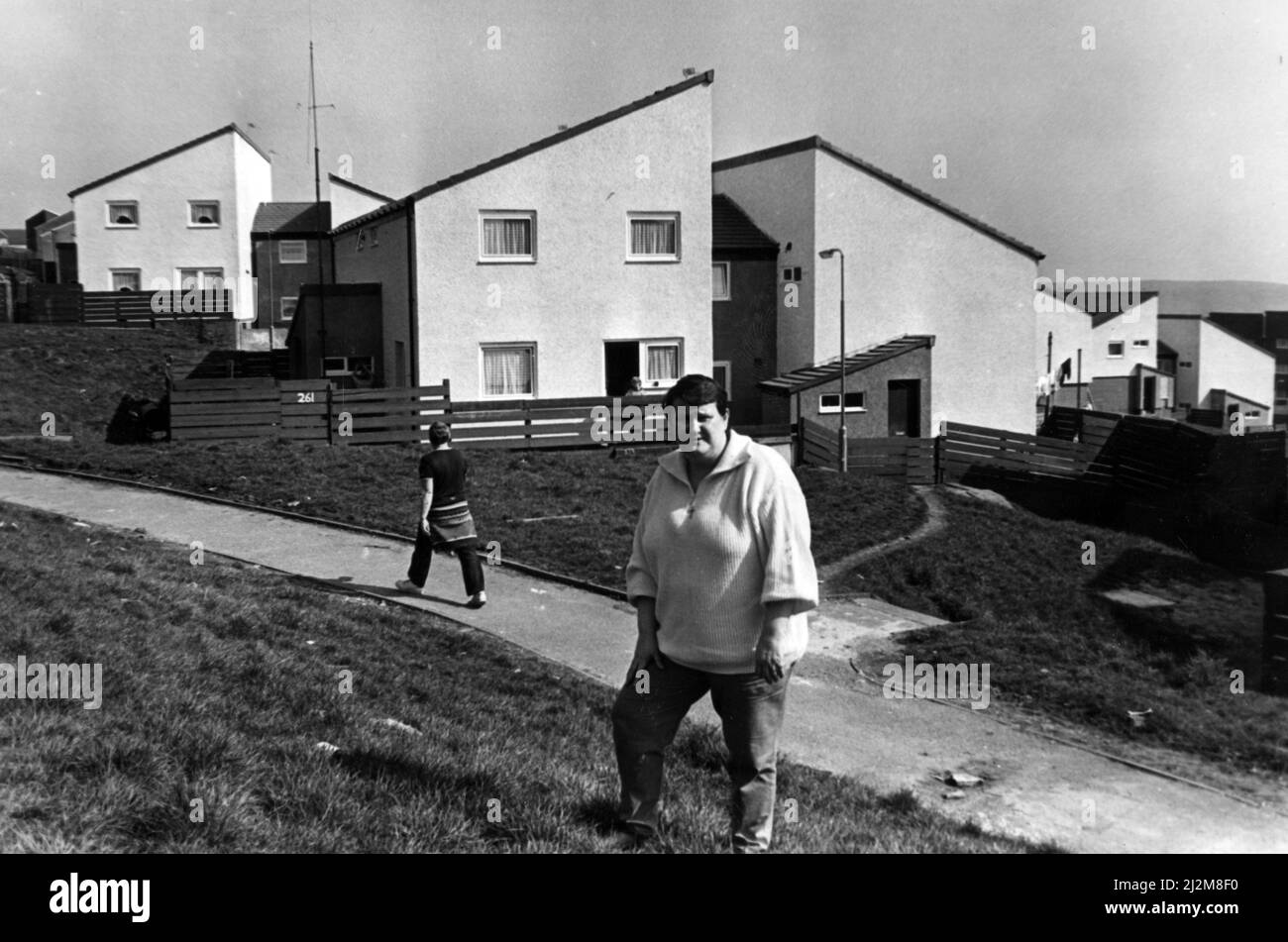 Council tenant liaison officer Denise Yeates outside refurbished houses