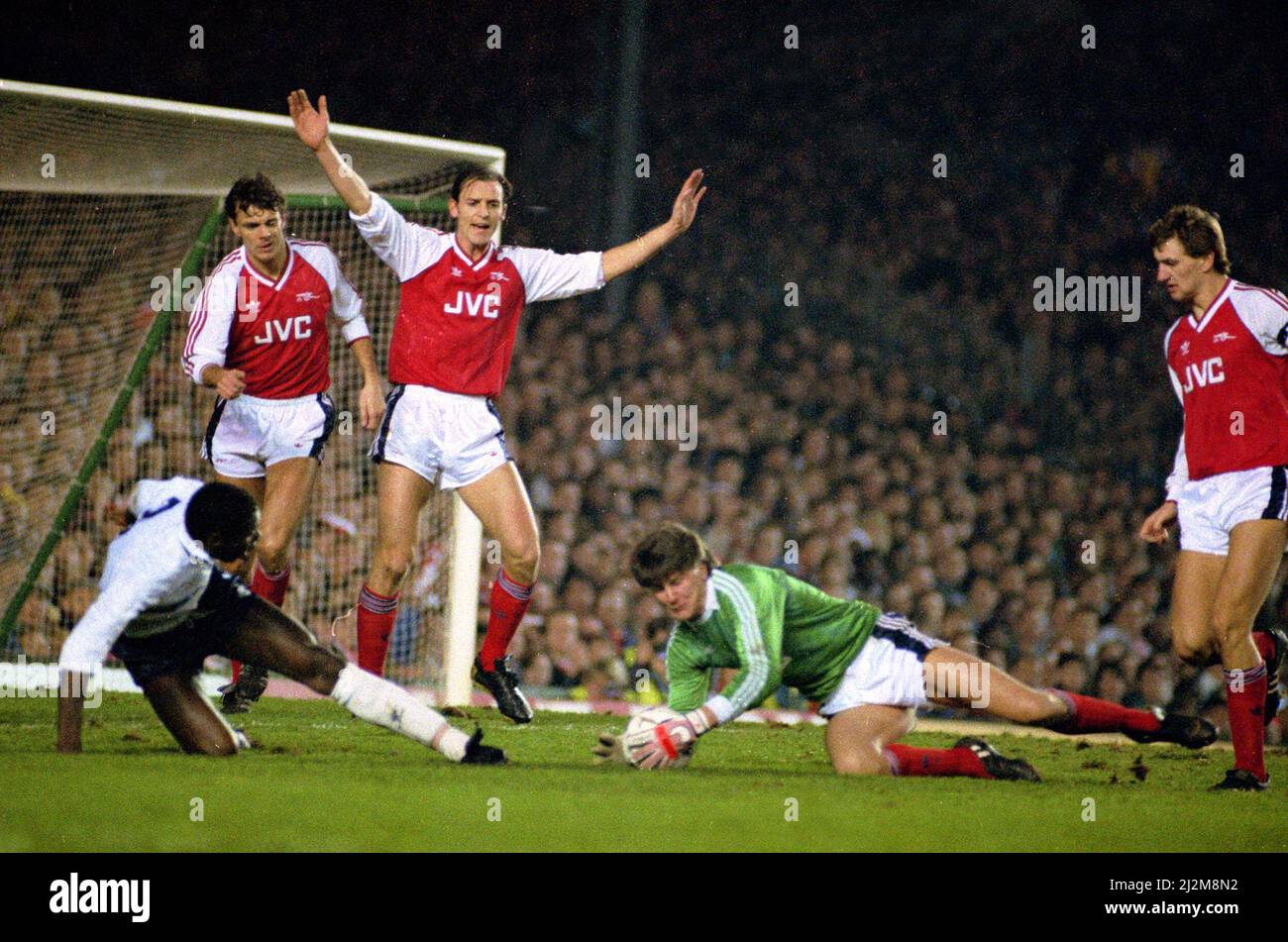 Football English League Division One 1988/89 Season. Arsenal 2 v Tottenham Hotspur 0  at Highbury Arsenal's goalkeeper John Lukic holds onto the ball after a Spurs attack supported by his defenders Stock Photo