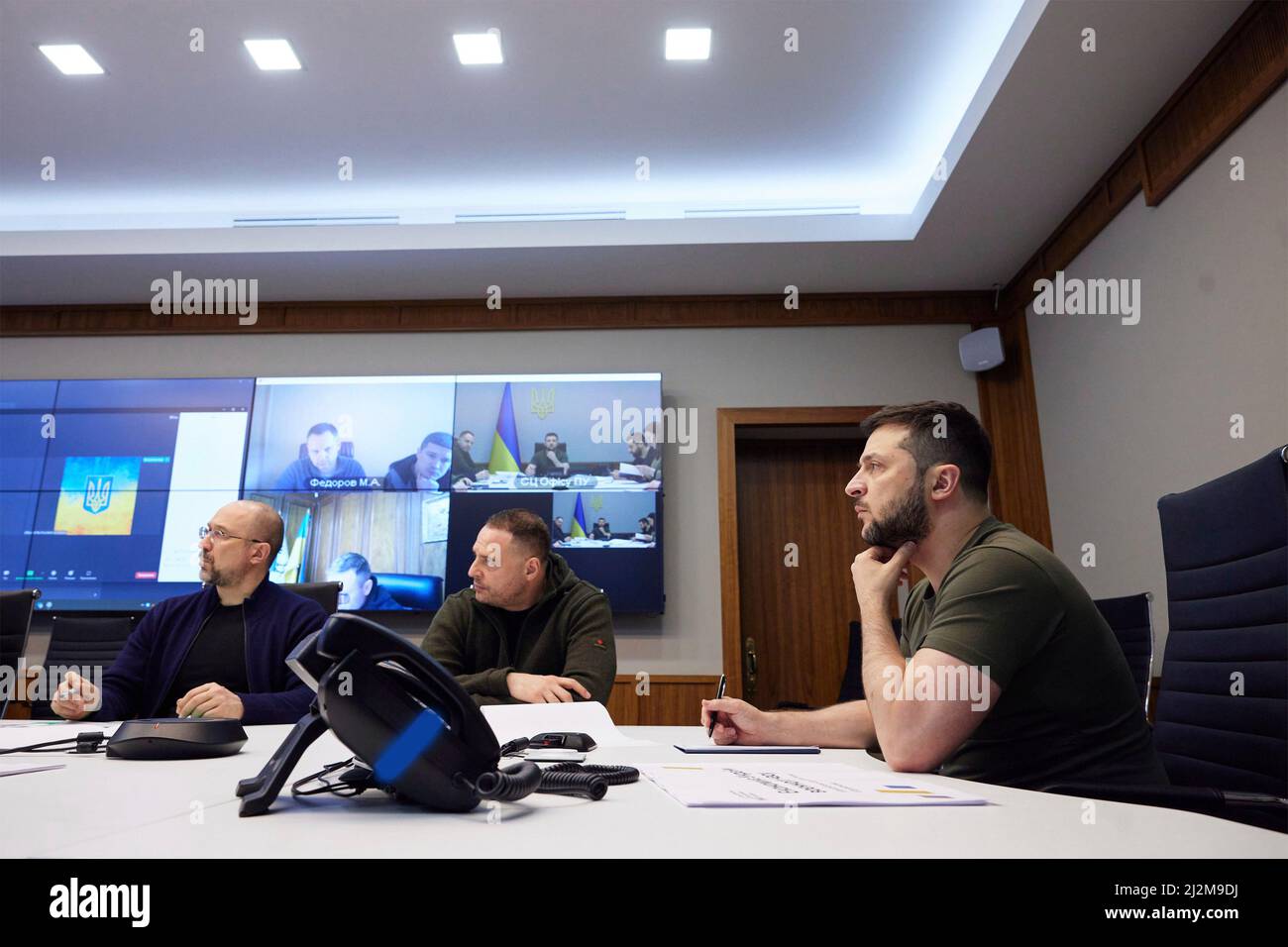Kyiv, Ukraine. 02nd Apr, 2022. Ukrainian President Volodymyr Zelenskyy, right, holds a meeting on the economy effects of the Russian invasion and rebuilding infrastructure, April 2, 2022 in Kyiv, Ukraine. Credit: Ukraine Presidency/Ukraine Presidency/Alamy Live News Stock Photo