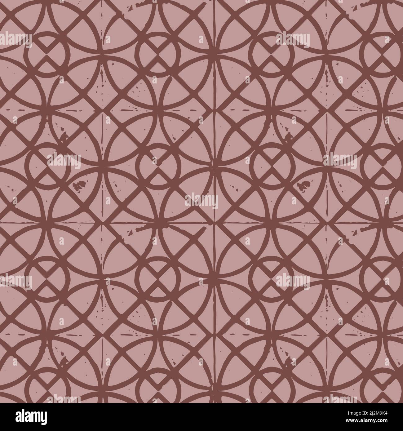 Antique tile repeating pattern background a seamless pattern in dusty rose and brick red for design elements. Stock Photo