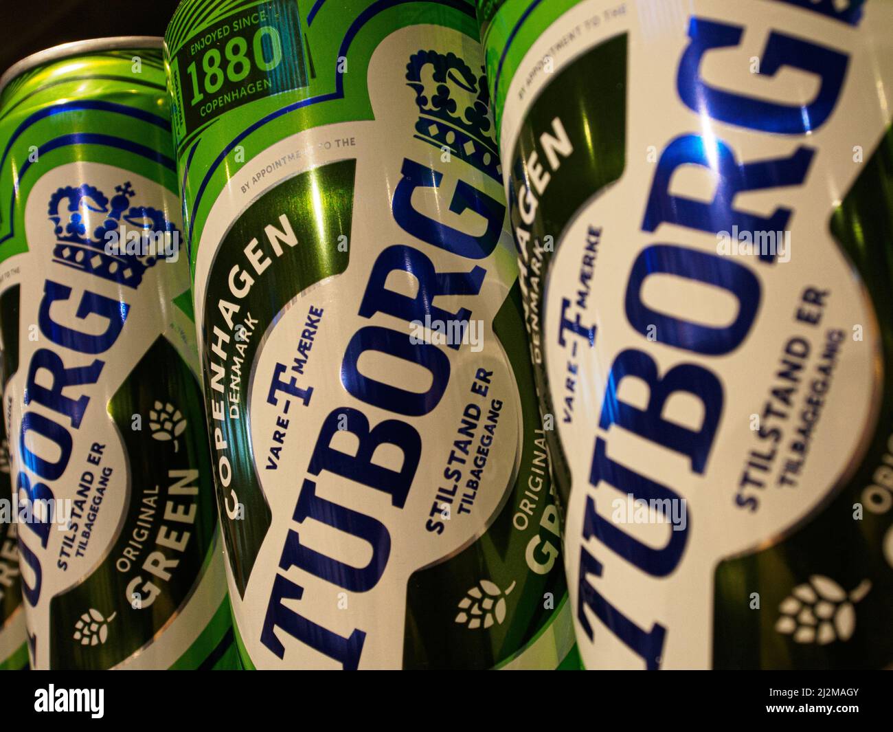 Tuborg beer cans on the supermarket shelf. It was reported that Carlsberg Group is leaving the Russian market and plans to transfer the local business to a new investor. The Danish brewing company 'Carlsberg' is represented in Russia by the brands 'Carlsberg', 'Kronenbourg', 'Holsten' and 'Tuborg' Stock Photo