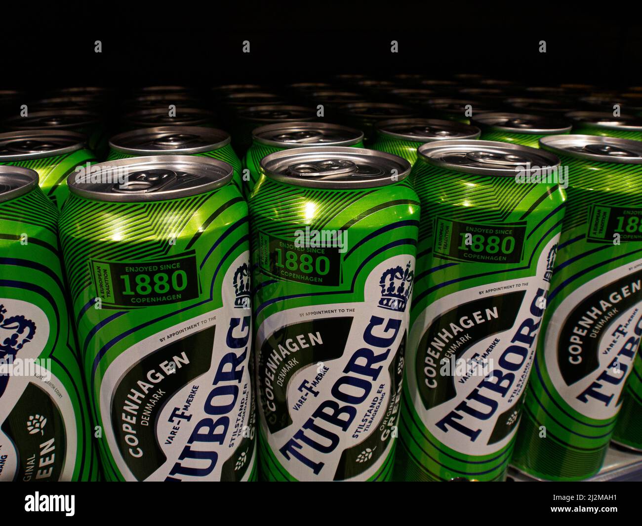 Tuborg beer cans on the supermarket shelf. It was reported that Carlsberg Group is leaving the Russian market and plans to transfer the local business to a new investor. The Danish brewing company 'Carlsberg' is represented in Russia by the brands 'Carlsberg', 'Kronenbourg', 'Holsten' and 'Tuborg' Stock Photo