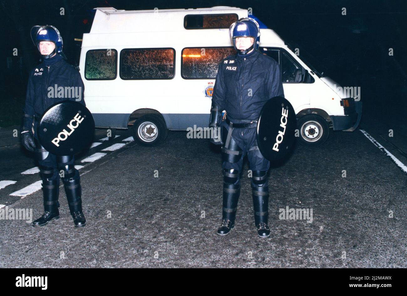 Policemen in riot gear on Waterville Road at the height of the ...