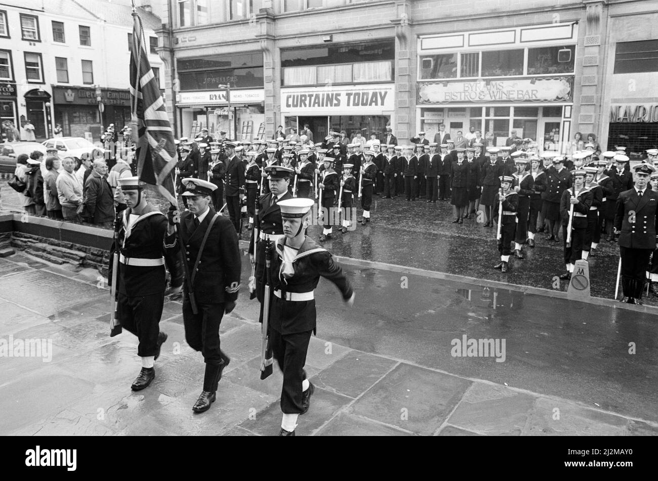 Some 200 Sea Cadets from all over West Yorkshire paraded through Huddersfield as part of the celebrations for Trafalgar Day, Some 25 Huddersfield cadets took part in the event, along with others from Dewsbury, Wakefield, Bradford, Castleford, Keighley and Leeds. The reviewing officer was Capt Jim Davis, president of the Huddersfield unit and a special service in Huddersfield Parish Church was conducted by the town's new vicar, the Rev Brian McGuire. 22nd October 1989. Stock Photo