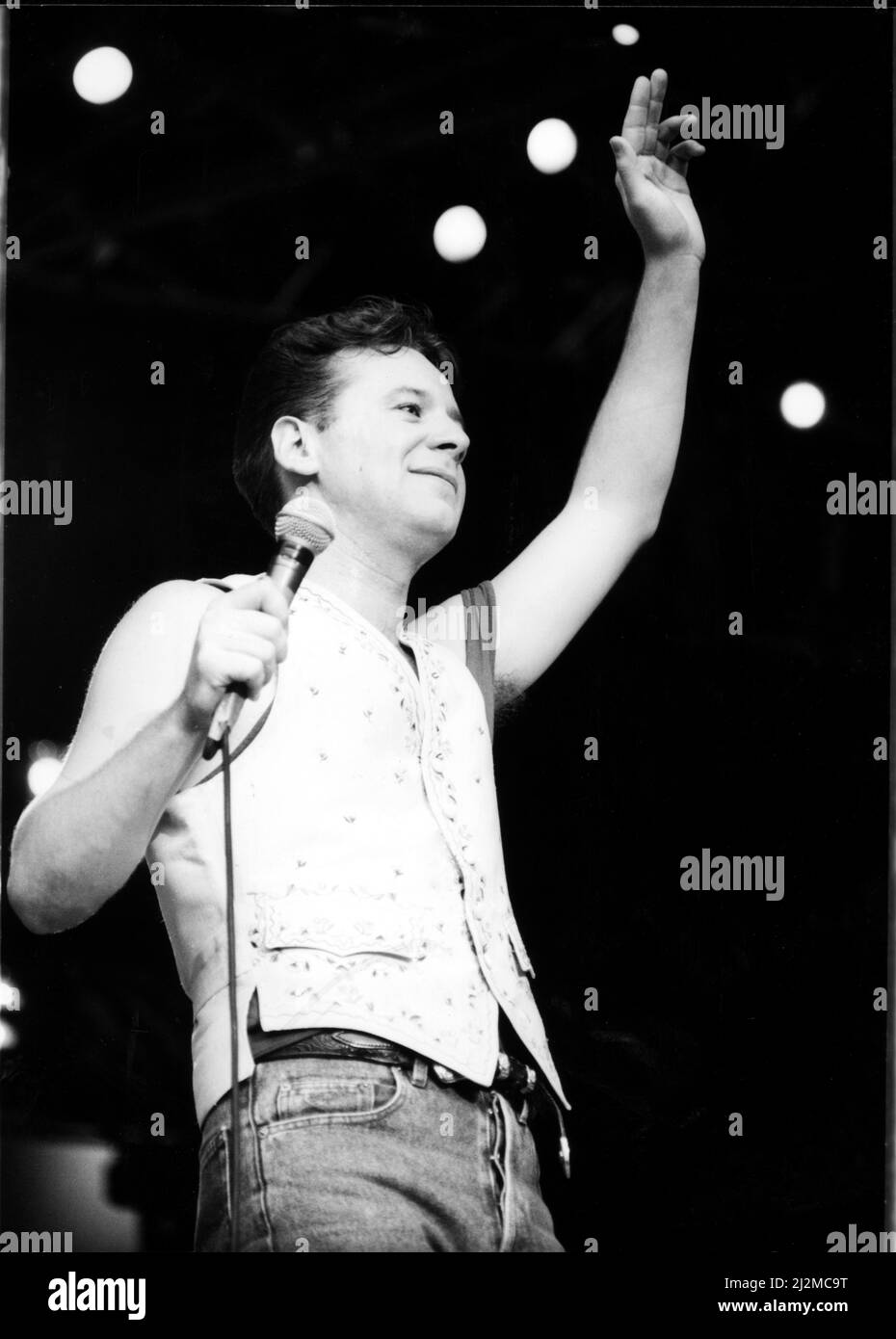 Jim Kerr, lead singer of the rock group Simple Minds entertains the