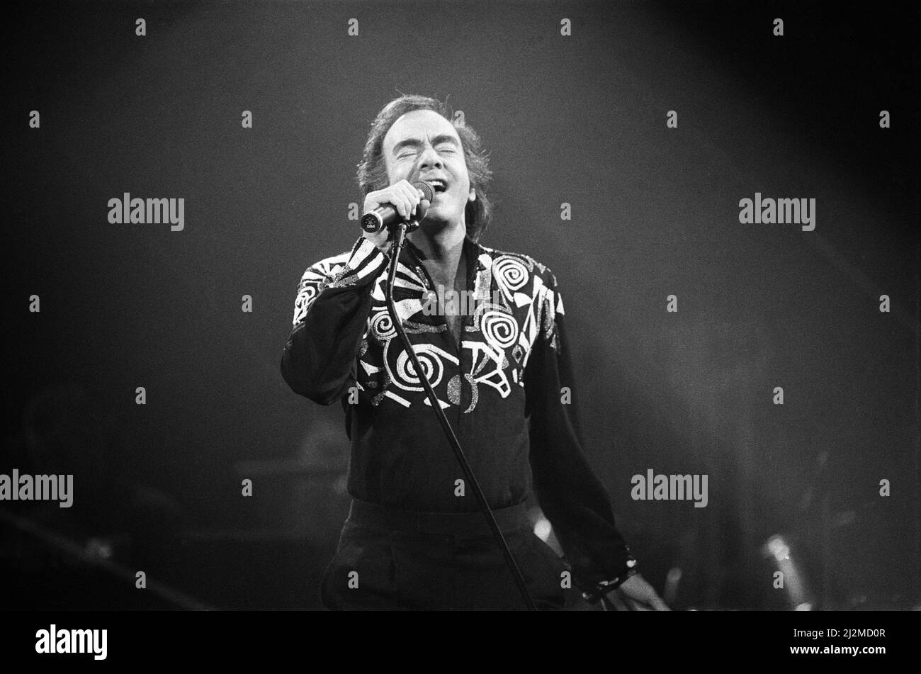 American singer Neil Diamond in concert at the NEC Arena, Birmingham. 8th November 1989. Stock Photo