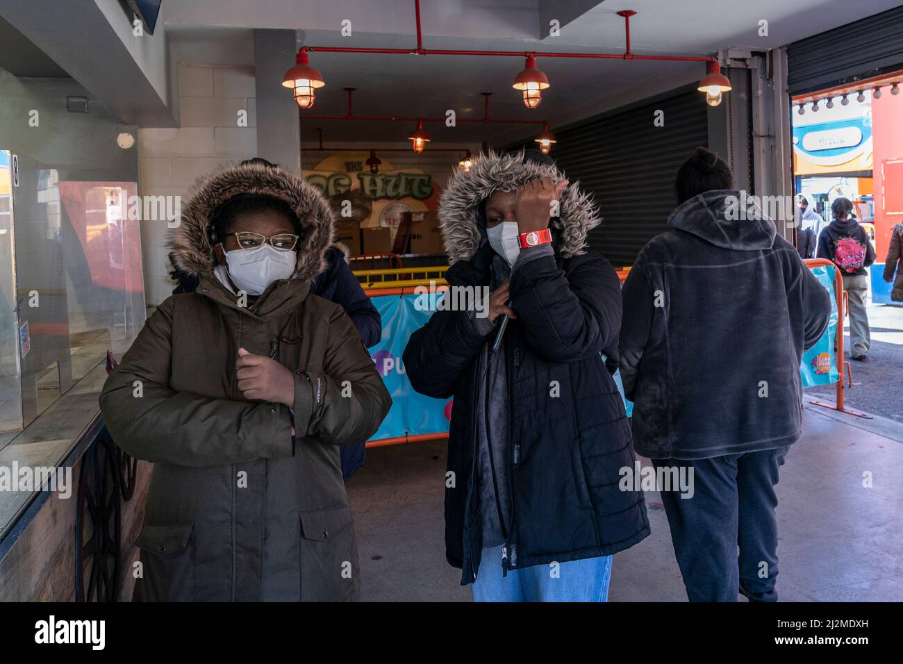 New York, NY April 2, 2022 First visitors displaying wrist bands to